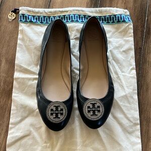 Tory Burch ballet flats. Black leather with rhinestone T emblem.
